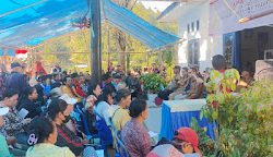 Bhabinkmtibmas Polsek Mambi Monitoing dan Berikan Pengamanan Kegiatan Kementerian Sosial di Kec. Rantebulahan Timur