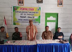 Bhabinkamtibmas Polsek Mamasa Laksanakan Pengamanan Penerimaan Bantuan Langsung Tunai Desa Orobua Timur