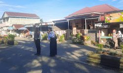 Commander Wish Pagi, Satlantas Polres Pasangkayu Bantu Seberangkan Anak Sekolah