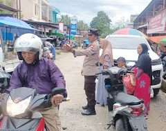 Polsek Tapango Laksanakan Pengamanan dan Pengaturan Lalu Lintas di Pasar Palitakan