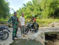 Babinsa Sertu Suprianto Turut Serta dalam Pemantauan Pencarian Motor yang Terjatuh di Sungai