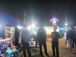 Personel Polsek Mambi Monitoring dan Pengamanan Pasar Malam di Lapangan Sepak Bola