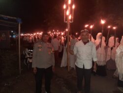Personel Polsek Banggae Amankan Pawai Obor Santri Pondok Pesantren Ihyaul Ulum DDI Baruga