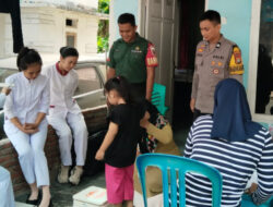 Sinergitas Bhabinkamtibmas Polres Majene dan Babinsa Dukung Pencegahan Stunting Melalui Pendampingan Posyandu