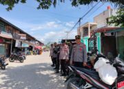 Kapolsek Tapango Pimpin Pengamanan dan Pengaturan Lalu Lintas di Pasar Tradisional Palitakan Kecamatan Tapango