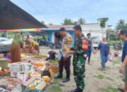 Bhabinkamtibmas Polsek Bambalamotu Bersama Babinsa Amankan Pasar Tradisional Bambaira