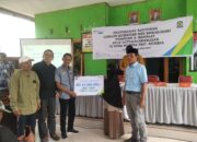Penyerahan Santunan Jaminan Kematian dan Sosialisasi BPJS Ketenagakerjaan di Desa Rumbia