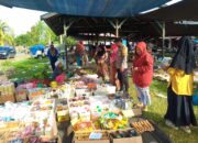 Bhabin Polsek Bambalamotu di Tengah Hiruk Pikuk Pasar: Wujud Nyata Polisi Hadir di Tengah Masyarakat