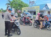 Si Propam Polres Pasangkayu Tebar Semangat Merah Putih di Jalanan Kota