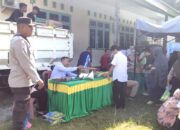 Personel Polsubsektor Tubo Sendana Amankan Kegiatan Gerakan Pangan Murah di Kantor Kecamatan Tubo Sendana