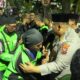 Driver Ojol Gelar Aksi Damai dan Shalat Gaib di Depan Mapolres Pasuruan