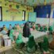 Bhabinkamtibmas Polsek Sarudu Dampingi Kegiatan Pemberian Makan Bergizi untuk Ribuan Siswa di Duripoku