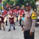 Personel Polsek Pamboang Amankan Arak-Arakan Maulid Nabi dan Pissawe Totamma di Desa Simbang