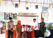 Kapolsek Banggae Hadiri Launching SPPG Yayasan Haji Masdar Pasmar di SDN 24 Saleppa