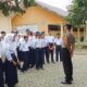 Cegah Kenakalan Remaja, Bhabinkamtibmas Sambangi SMPN 1 Bambalamotu dan Beri Edukasi Kamtibmas