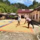 Bhabinkamtibmas Penjemuran Jagung Hasil Panen Warga, Siap Didorong ke Bulog