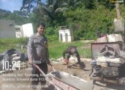 Bhabinkamtibmas polsek mambi perkuat kebersamaan melalui gotong royong di desa bambang
