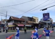 Jamin Kelancaran Kegiatan, Satlantas Polres Majene Kawal Jalan Santai Dies Natalis STIKes Bina Bangsa