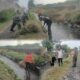 Cegah Penyumbatan dan Banjir, Babinsa Ngerong Ajak Warga Bersihkan Sungai