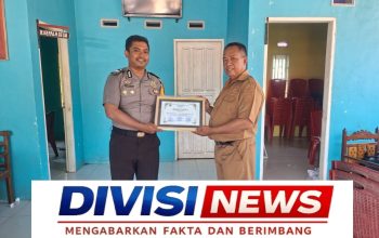 Bhabinkamtibmas Desa Amola Terima Penghargaan dari Pemerintah Desa atas Dedikasi Menjaga Kamtibmas